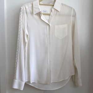 Woman’s silk Equipment cream top  sleeve detail